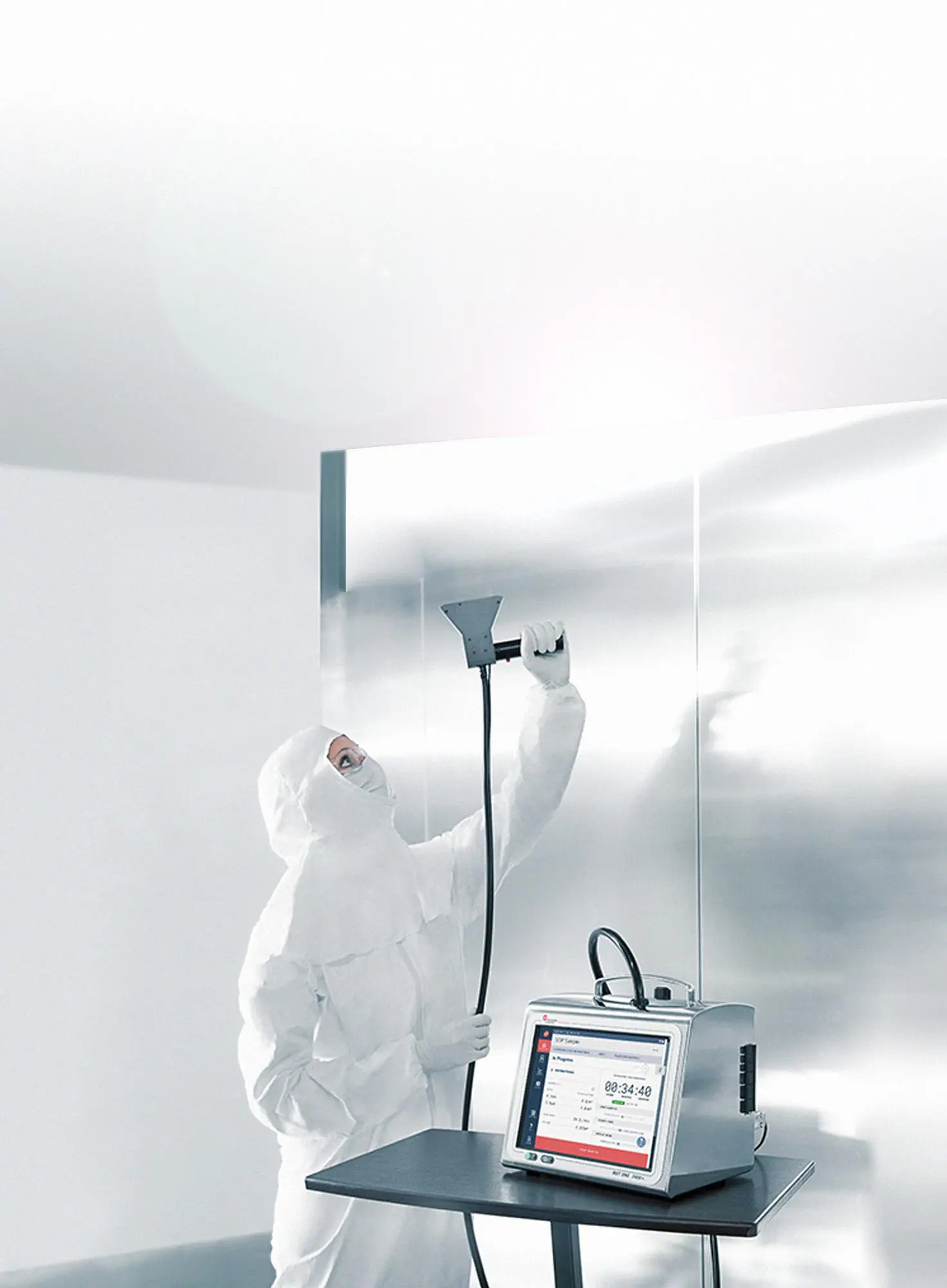 A lab technician using particle counter to check air purity